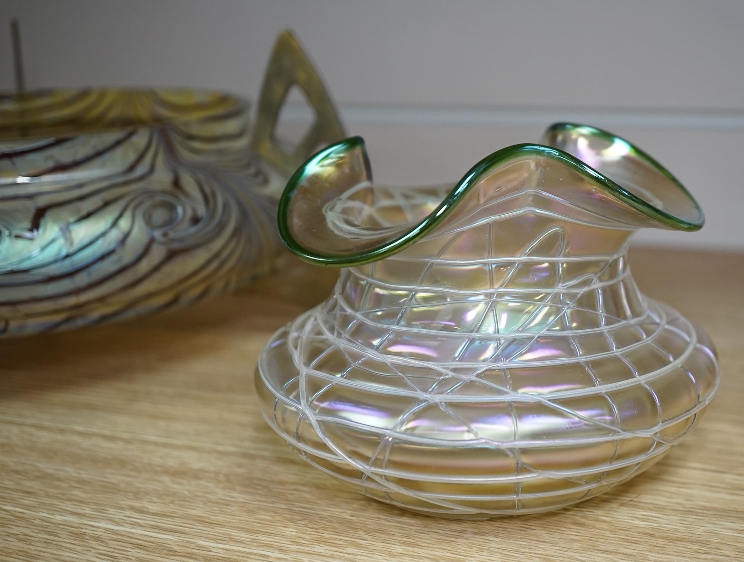 An Otto Tham iridescent glass centrepiece on brass stand, probably designed by Friedrich Wilhelm Heckert and two Pallme König glass vases, centrepiece 20cm diameter not including stand. Condition - good